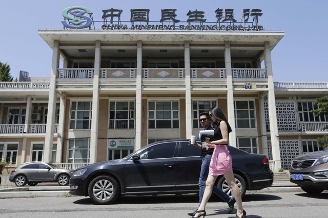 Giám đốc chi nhánh ngân hàng Trung Quốc lừa khách hơn 400 triệu USD để sống ‘sang chảnh’ - Ảnh 1.